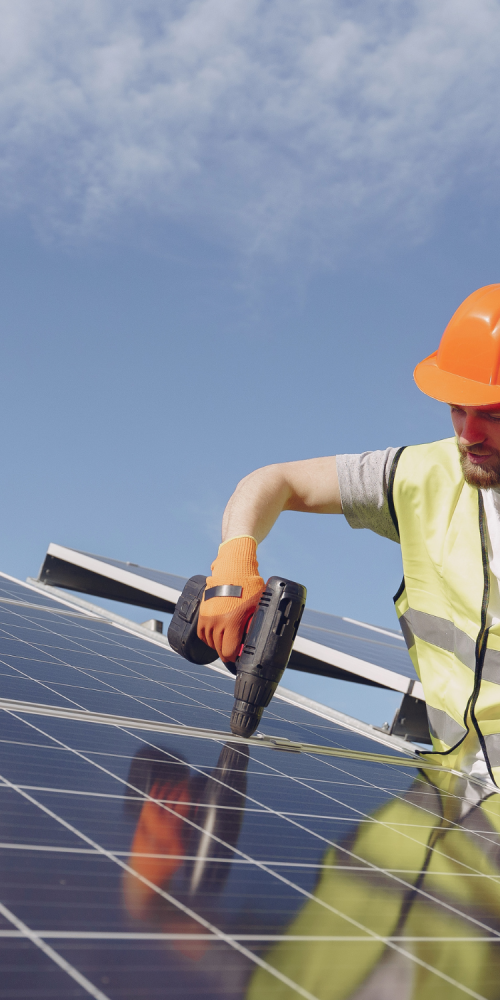 engineer installing solar panels